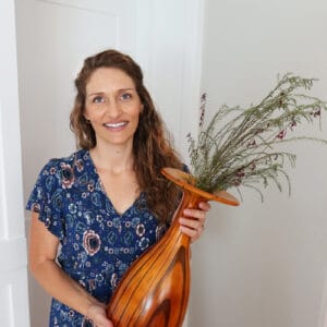 me holding vase
